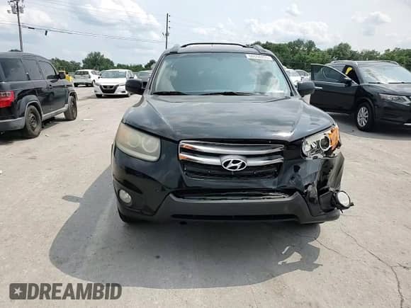 2012 Hyundai Santa Fe Limited z VIN 5XYZK4AG9CG107132, wystawiony jako Copart lot #60558455 z przebiegiem 189 403 mil mil oraz Szkoda całkowita • Salvage title. Historia ofert i sprzedaży dostępna na DreamBid. Obrazek 14.