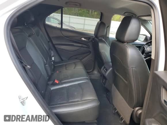 2020 Chevrolet Equinox Premier с VIN 3GNAXXEV9LS699792, выставлен на аукционе Copart как лот 70951615 с пробегом 104 428 миль миль и Списание • Salvage title. История ставок и продаж доступна на DreamBid. Изображение 11.