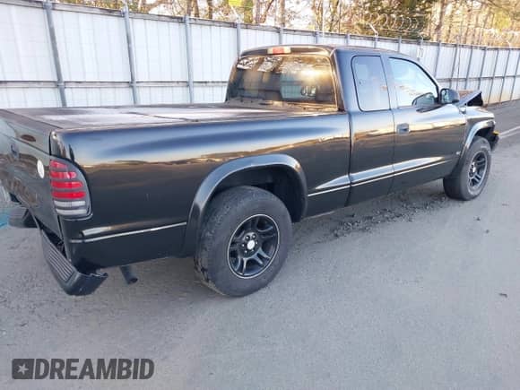 2002 Dodge Dakota SLT with VIN 1B7GL42X92S524987, listed as a IAAI auction lot 41116288 with 221,640 mi miles and . Bid and sale history available at DreamBid. Image 4.