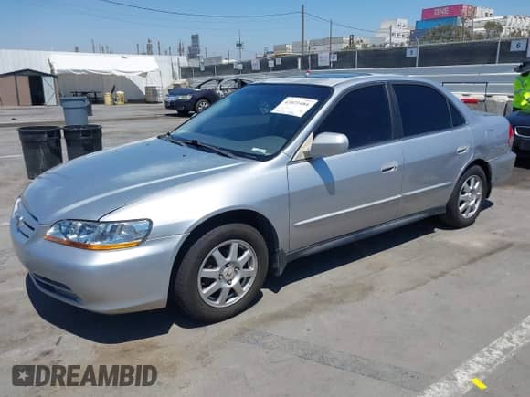 2002 Honda Accord SE with VIN JHMCG56742C010055, listed as a IAAI auction lot 43021484 with 174,310 mi miles and . Bid and sale history available at DreamBid. Image 2.