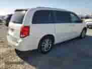 2013 Dodge Grand Caravan SXT with VIN 2C4RDGCG9DR618622, listed as a Copart auction lot 90457375 with 181,498 mi miles and Salvage title. Bid and sale history available at DreamBid. Image 3.