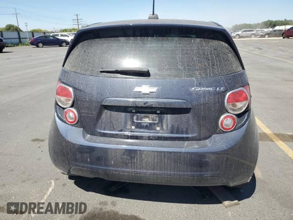 2016 Chevrolet Sonic LT с VIN 1G1JC6SH7G4139071, выставлен на аукционе Copart как лот 69221235 с пробегом 69 235 миль миль и Списание • Salvage title. История ставок и продаж доступна на DreamBid. Изображение 6.