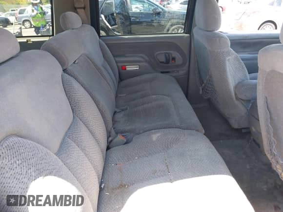 1999 Chevrolet Tahoe z VIN 1GNEC13R9XJ503955, wystawiony jako IAAI lot #42830511 z przebiegiem 185 483 mil mil oraz . Historia ofert i sprzedaży dostępna na DreamBid. Obrazek 8.