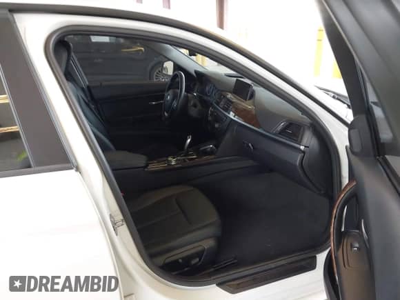 2014 BMW 3 Series 328i with VIN WBA3C1C57EK117469, listed as a IAAI auction lot 43207455 with 77,275 mi miles and . Bid and sale history available at DreamBid. Image 5.