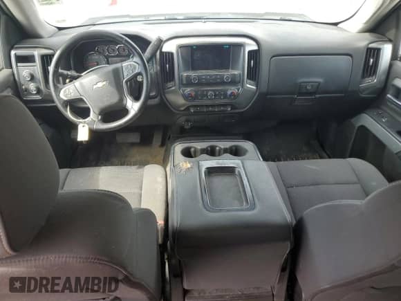 2018 Chevrolet Silverado 1500 LT z VIN 3GCUKREC7JG484152, wystawiony jako Copart lot #71714215 z przebiegiem 158 596 mil mil oraz Szkoda całkowita • Salvage title. Historia ofert i sprzedaży dostępna na DreamBid. Obrazek 8.