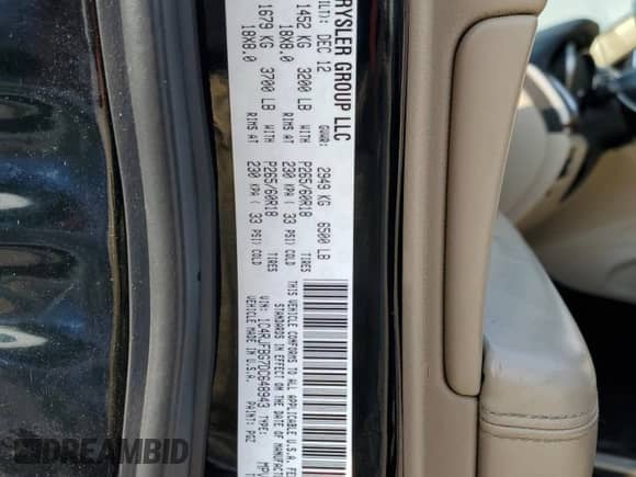 2013 Jeep Grand Cherokee Limited z VIN 1C4RJFBG7DC648943, wystawiony jako Copart lot #85731515 z przebiegiem 200 146 mil mil oraz Szkoda całkowita • Salvage title. Historia ofert i sprzedaży dostępna na DreamBid. Obrazek 13.