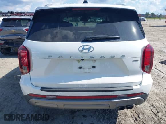 2023 Hyundai Palisade SEL z VIN KM8R4DGE8PU608514, wystawiony jako IAAI lot #42558179 z przebiegiem 34 277 mil mil oraz . Historia ofert i sprzedaży dostępna na DreamBid. Obrazek 16.