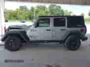 2021 Jeep Wrangler Unlimited Willys Sport with VIN 1C4HJXDG8MW722786, listed as a IAAI auction lot 43035484 with 83,071 mi miles and . Bid and sale history available at DreamBid. Image 14.