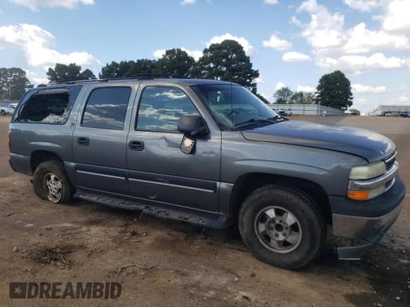 2002 Chevrolet Suburban LS z VIN 3GNEC16ZX2G133511, wystawiony jako Copart lot #74059784 z przebiegiem Nie podano mil oraz Szkoda całkowita • Salvage title. Historia ofert i sprzedaży dostępna na DreamBid. Obrazek 3.
