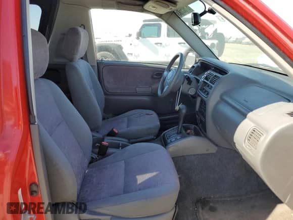 1999 Chevrolet Tracker z VIN 2CNBE18C9X6904523, wystawiony jako Copart lot #67675345 z przebiegiem 124 806 mil mil oraz Czysty tytuł • Clean title. Historia ofert i sprzedaży dostępna na DreamBid. Obrazek 10.