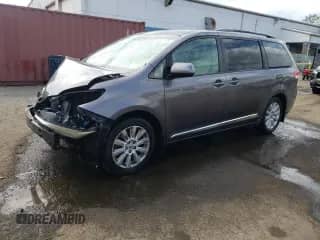 2012 Toyota Sienna LE with VIN 5TDJK3DC2CS033328, listed as a Copart auction lot 62202895 with 169,392 mi miles and Salvage title. Bid and sale history available at DreamBid. Image 1.
