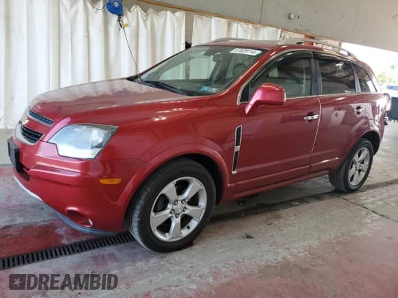 2015 Chevrolet Captiva Sport LT with VIN 3GNAL3EK7FS503797, listed as a Copart auction lot 67829114 with 103,670 mi miles and Salvage title. Bid and sale history available at DreamBid. Image 1.