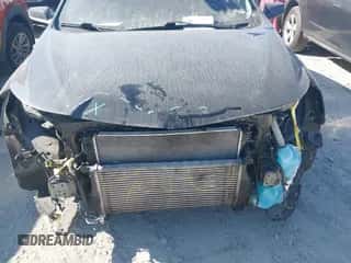 2018 Chevrolet Malibu LT z VIN 1G1ZD5ST9JF153533, wystawiony jako IAAI lot #43187054 z przebiegiem 136 317 mil mil oraz . Historia ofert i sprzedaży dostępna na DreamBid. Obrazek 6.