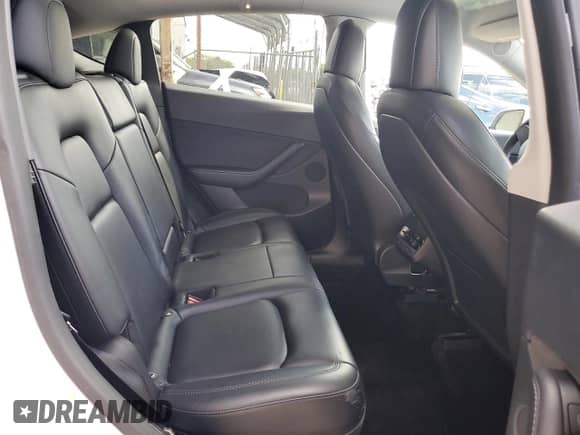 2021 Tesla Model Y Long Range z VIN 5YJYGDEE4MF295914, wystawiony jako Copart lot #85107055 z przebiegiem 49 996 mil mil oraz Szkoda całkowita • Salvage title. Historia ofert i sprzedaży dostępna na DreamBid. Obrazek 11.