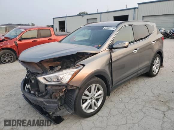 2014 Hyundai Santa Fe с VIN 5XYZUDLA8EG202755, выставлен на аукционе Copart как лот 67065515 с пробегом 125 235 миль миль и Списание • Salvage title. История ставок и продаж доступна на DreamBid. Изображение 1.