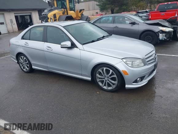 2010 Mercedes-Benz C 300 Sport with VIN WDDGF8BB9AR092237, listed as a IAAI auction lot 43499613 with 210,763 mi miles and . Bid and sale history available at DreamBid. Image 1.