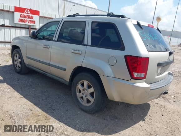 2009 Jeep Grand Cherokee Laredo with VIN 1J8GS48K19C508293, listed as a IAAI auction lot 43037613 with 220,733 mi miles and . Bid and sale history available at DreamBid. Image 3.