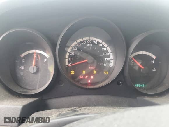 2010 Dodge Grand Caravan Cargo with VIN 2D4CN1AEXAR377301, listed as a Copart auction lot 71476774 with 125,421 mi miles and Salvage title. Bid and sale history available at DreamBid. Image 9.