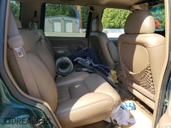 1995 Chevrolet Tahoe z VIN 1GNEK13K7SJ429532, wystawiony jako Copart lot #59402125 z przebiegiem 188 257 mil mil oraz Szkoda całkowita • Salvage title. Historia ofert i sprzedaży dostępna na DreamBid. Obrazek 11.