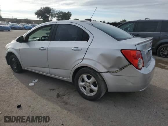 2015 Chevrolet Sonic LTZ with VIN 1G1JE5SB8F4187841, listed as a Copart auction lot 80360905 with 87,546 mi miles and Salvage title. Bid and sale history available at DreamBid. Image 2.