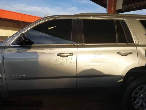 2019 Chevrolet Tahoe LS with VIN 1GNSCAKC5KR200293, listed as a IAAI auction lot 41509854 with 77,823 mi miles and . Bid and sale history available at DreamBid. Image 15.