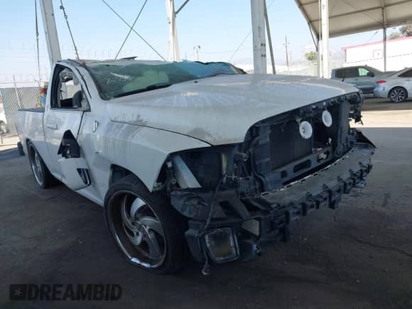 2014 Ram 1500 Express z VIN 3C6JR6AT4EG285012, wystawiony jako IAAI lot #42867183 z przebiegiem Nie podano mil oraz . Historia ofert i sprzedaży dostępna na DreamBid. Obrazek 1.