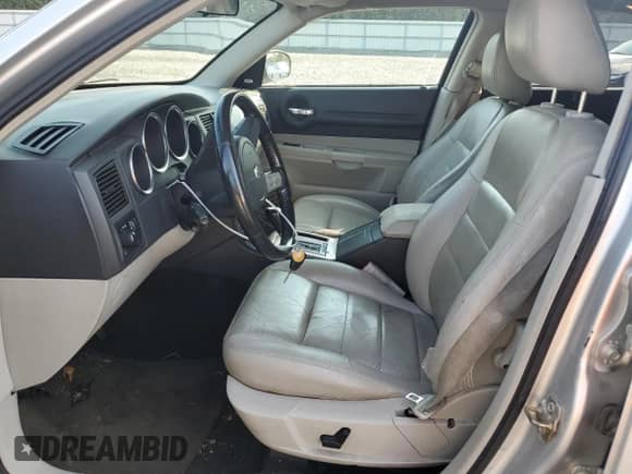 2005 Dodge Magnum RT with VIN 2D4GV58255H677120, listed as a Copart auction lot 65955544 with 157,671 mi miles and Salvage title. Bid and sale history available at DreamBid. Image 7.