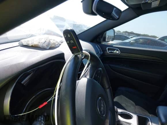 2022 Jeep Grand Cherokee Laredo X with VIN 1C4RJFAG3NC151696, listed as a IAAI auction lot 43137250 with 21,521 mi miles and . Bid and sale history available at DreamBid. Image 11.