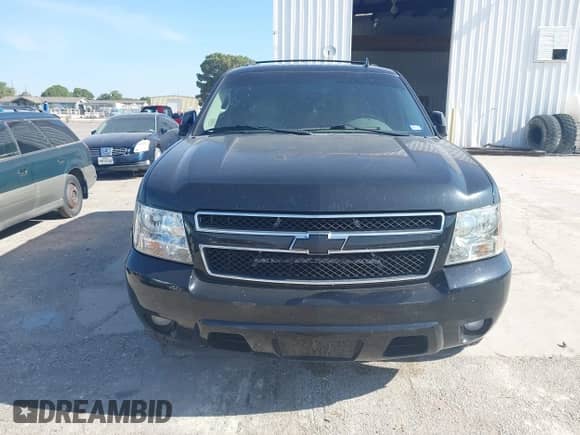 2011 Chevrolet Tahoe LT z VIN 1GNSCBE09BR140039, wystawiony jako IAAI lot #42728213 z przebiegiem 229 460 mil mil oraz . Historia ofert i sprzedaży dostępna na DreamBid. Obrazek 12.