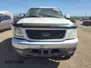 1999 Ford F-150 XL with VIN 1FTRX18L4XKB62686, listed as a Copart auction lot 84807295 with 189,359 mi miles and Salvage title. Bid and sale history available at DreamBid. Image 5.