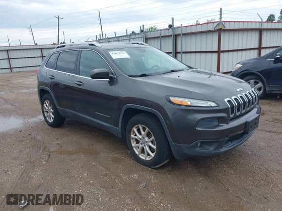 2014 Jeep Cherokee Latitude with VIN 1C4PJMCBXEW250804, listed as a IAAI auction lot 41874944 with 93,171 mi miles and . Bid and sale history available at DreamBid. Image 1.