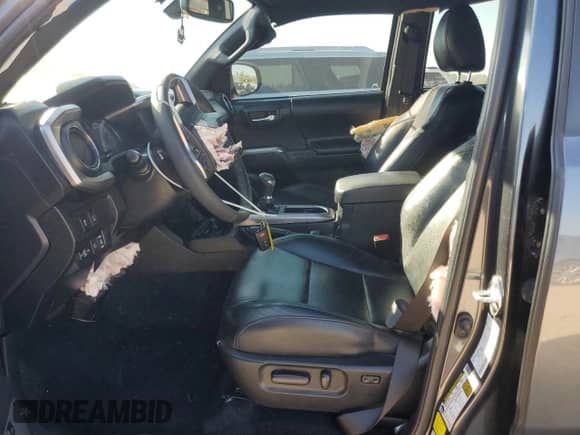 2023 Toyota Tacoma Limited с VIN 3TMEZ5CN0PM210248, выставлен на аукционе Copart как лот 86876645 с пробегом 28 190 миль миль и Списание • Salvage title. История ставок и продаж доступна на DreamBid. Изображение 7.