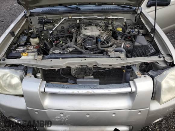 2003 Nissan Frontier XE with VIN 1N6ED29Y43C414977, listed as a Copart auction lot 43938595 with 212,303 mi miles and Salvage title. Bid and sale history available at DreamBid. Image 11.