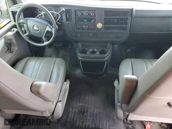 2014 Chevrolet Express Passenger LS с VIN 1GNSGBF44E1147795, выставлен на аукционе Copart как лот 90305755 с пробегом 124 358 миль миль и Чистый • Clean title. История ставок и продаж доступна на DreamBid. Изображение 8.