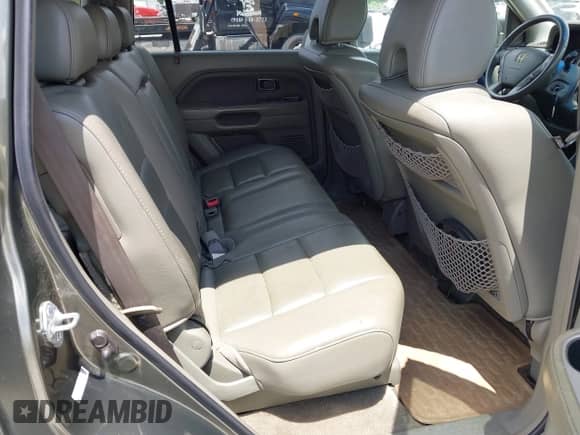 2006 Honda Pilot EX-L with VIN 5FNYF18656B024871, listed as a IAAI auction lot 42905751 with 232,872 mi miles and . Bid and sale history available at DreamBid. Image 8.