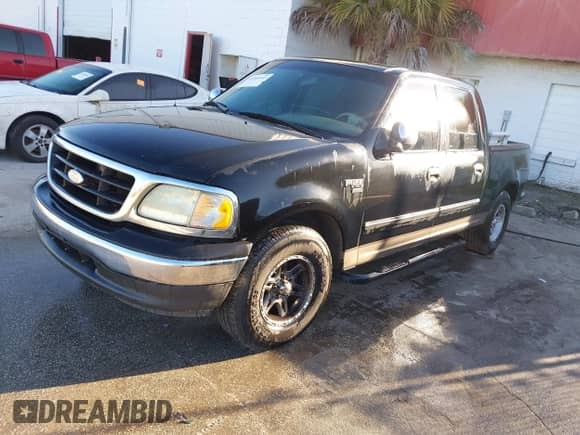 2003 Ford F-150 XLT z VIN 1FTRW07613KB48604, wystawiony jako IAAI lot #43381665 z przebiegiem Nie podano mil oraz . Historia ofert i sprzedaży dostępna na DreamBid. Obrazek 2.