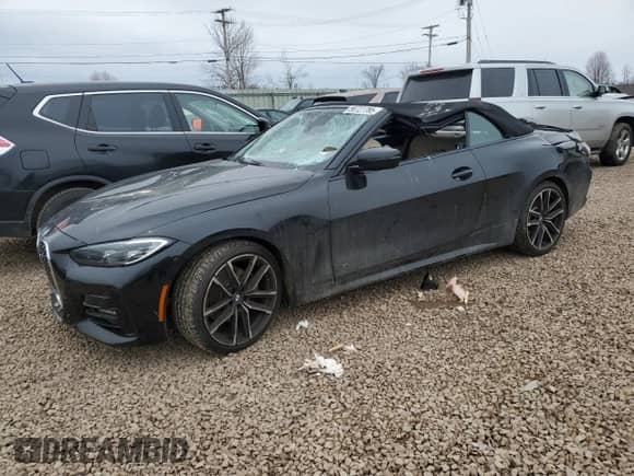 2023 BMW 4 Series 430i xDrive with VIN WBA43AT08PCM90476, listed as a Copart auction lot 50727785 with 11,677 mi miles and Salvage title. Bid and sale history available at DreamBid. Image 1.