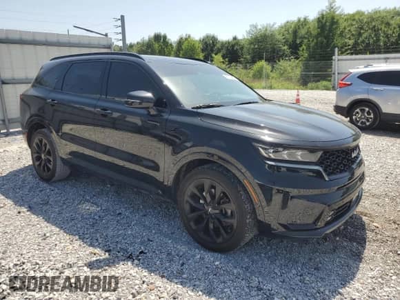 2023 Kia Sorento SX with VIN 5XYRK4LFXPG230416, listed as a Copart auction lot 65724905 with 28,977 mi miles and Salvage title. Bid and sale history available at DreamBid. Image 4.