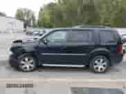 2013 Honda Pilot Touring with VIN 5FNYF4H97DB047819, listed as a IAAI auction lot 43299908 with 253,413 mi miles and . Bid and sale history available at DreamBid. Image 14.