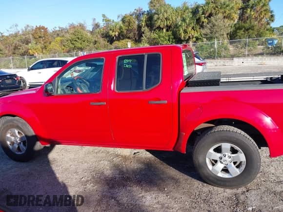 2009 Nissan Frontier SE with VIN 1N6AD07U19C419811, listed as a IAAI auction lot 41090904 with 141,119 mi miles and . Bid and sale history available at DreamBid. Image 14.