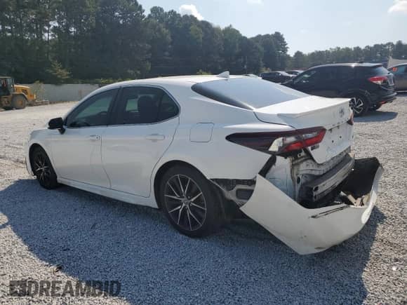 2021 Toyota Camry SE Nightshade z VIN 4T1G11AK8MU408838, wystawiony jako Copart lot #71665125 z przebiegiem 106 701 mil mil oraz Szkoda całkowita • Salvage title. Historia ofert i sprzedaży dostępna na DreamBid. Obrazek 2.