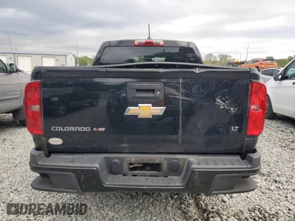 2018 Chevrolet Colorado 4WD LT с VIN 1GCGTCEN2J1100723, выставлен на аукционе Copart как лот 82118155 с пробегом 125 485 миль миль и Списание • Salvage title. История ставок и продаж доступна на DreamBid. Изображение 6.