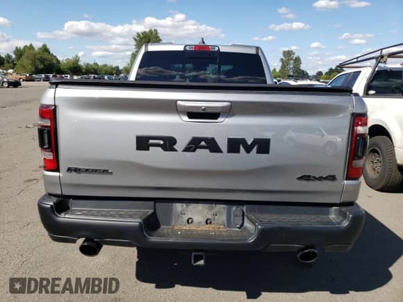 2020 Ram 1500 Rebel with VIN 1C6SRFET2LN281804, listed as a Copart auction lot 63704155 with 102,975 mi miles and Salvage title. Bid and sale history available at DreamBid. Image 6.