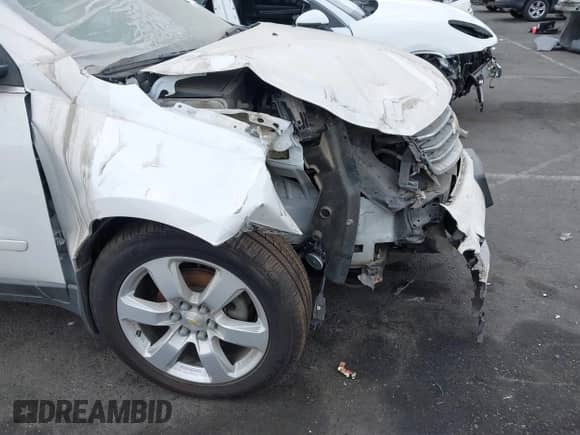 2017 Chevrolet Traverse LT z VIN 1GNKRGKD2HJ187505, wystawiony jako IAAI lot #43299284 z przebiegiem 80 256 mil mil oraz . Historia ofert i sprzedaży dostępna na DreamBid. Obrazek 18.