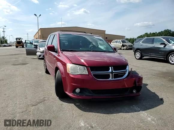 2014 Dodge Grand Caravan SXT 30th Anniversary with VIN 2C4RDGCGXER459093, listed as a Copart auction lot 80838535 with 128,561 mi miles and Salvage title. Bid and sale history available at DreamBid. Image 14.