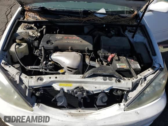 2004 Toyota Camry LE с VIN 4T1BE32K74U340136, выставлен на аукционе Copart как лот 82675565 с пробегом 172 175 миль миль и Чистый • Clean title. История ставок и продаж доступна на DreamBid. Изображение 11.