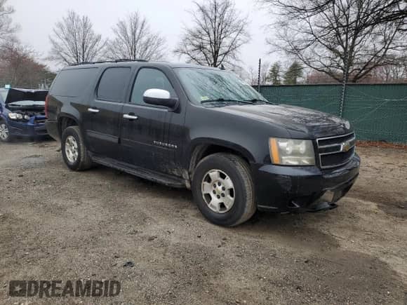 2011 Chevrolet Suburban LS с VIN 1GNSCHE07BR140737, выставлен на аукционе Copart как лот 49930345 с пробегом 225 239 миль миль и Списание • Salvage title. История ставок и продаж доступна на DreamBid. Изображение 4.
