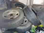 2004 Chevrolet Express Passenger with VIN 1GBFG15T041233492, listed as a Copart auction lot 82193815 with 219,338 mi miles and Salvage title. Bid and sale history available at DreamBid. Image 12.