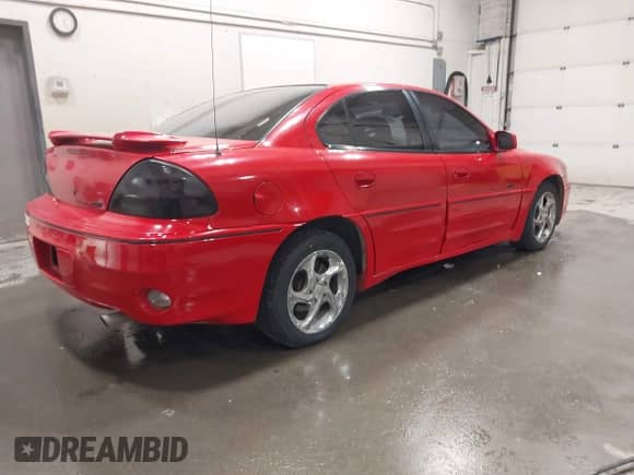 2000 Pontiac Grand Am GT z VIN 1G2NW52E4YM779647, wystawiony jako IAAI lot #42769292 z przebiegiem 200 419 mil mil oraz . Historia ofert i sprzedaży dostępna na DreamBid. Obrazek 4.