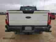2023 Ford F-250 XL z VIN 1FT7X2BA7PEC14508, wystawiony jako Copart lot #69988304 z przebiegiem 16 808 mil mil oraz Szkoda całkowita • Salvage title. Historia ofert i sprzedaży dostępna na DreamBid. Obrazek 6.